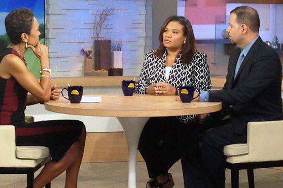 Juror "Maddy" and her lawyer speaking to Robin Roberts